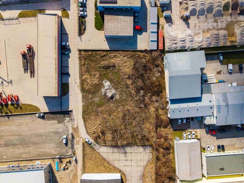 Aerial view of commercial land in Bratislava - Vajnory, surrounded by industrial buildings.