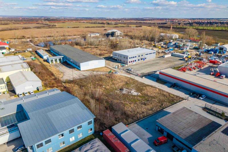 Aerial view of commercial land in Bratislava - Vajnory with buildings and open space.