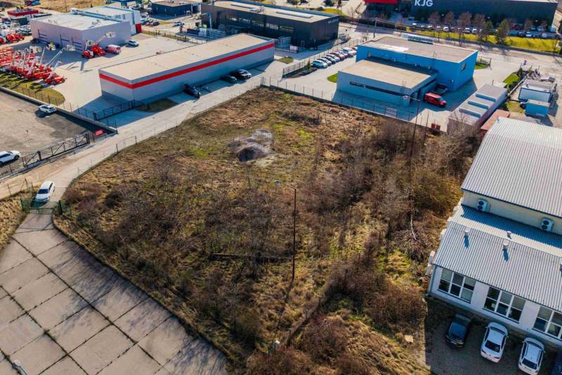 Plots - commercial in Bratislava - Vajnory, surrounded by industrial buildings and parking lots.