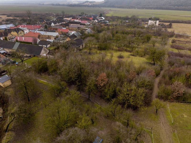 Natural scenery in the Recreational Grounds near Gemerské Teplice with a view of nearby houses.