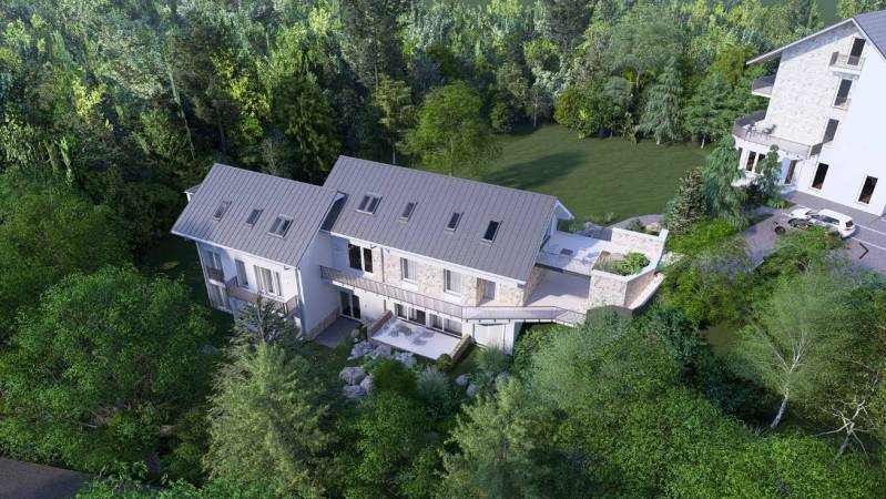 A house in a forest environment with a terrace in the High Tatras.