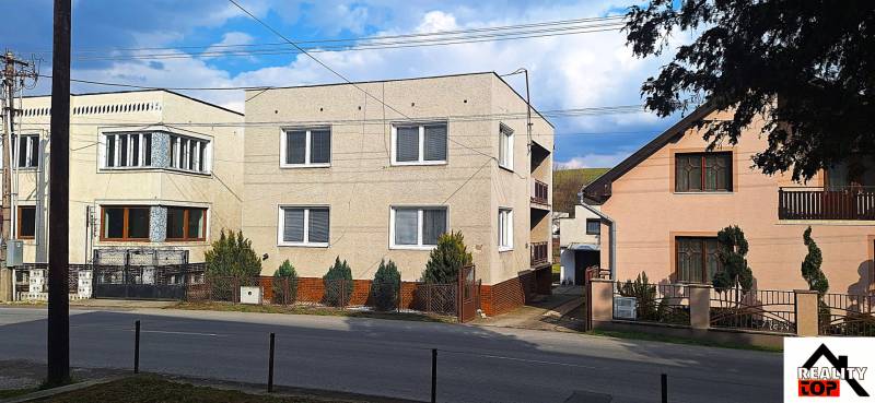A family house in Gemerský Jablonec with a simple facade and a small garden.