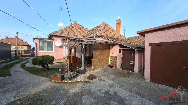 A family house in Lúčnica nad Žitavou on Martinova Street with a yard and garden.