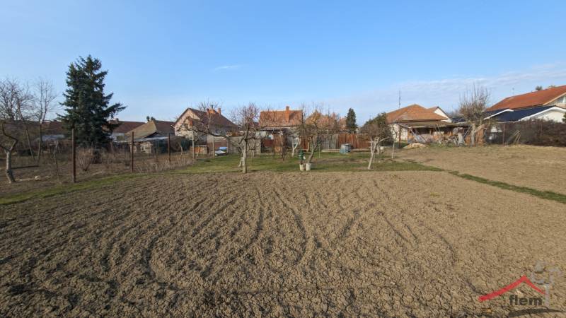 Garden with topsoil behind the family house on Martinova Street, Lúčnica nad Žitavou.
