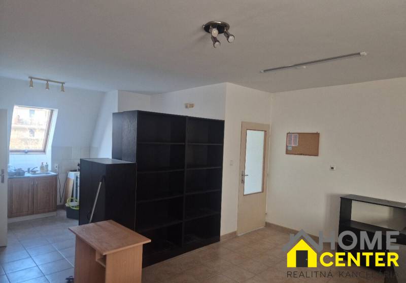 Interior of commercial spaces with shelves and cabinets, floor with decor.