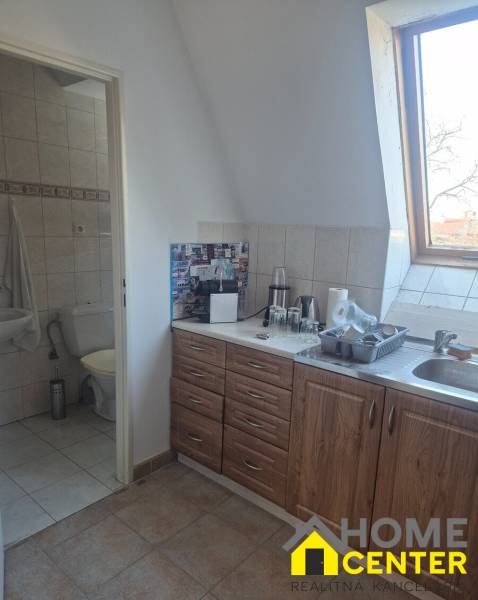 Kitchen corner with wood decor, toilet, interior of commercial premises.