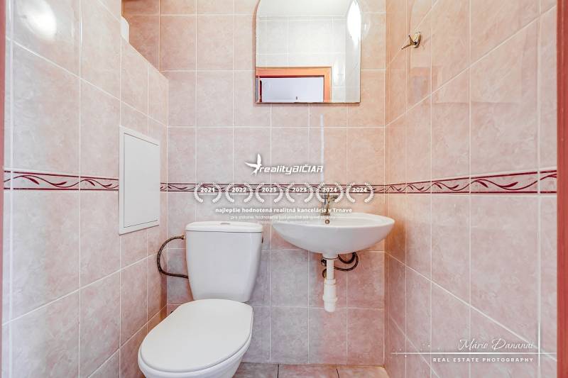 Bathroom with a mirror in a 3-room apartment, tiled.