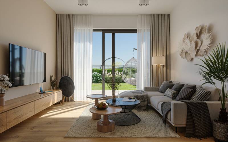 Living room in a family house with a large window and a floor with a wood decor.