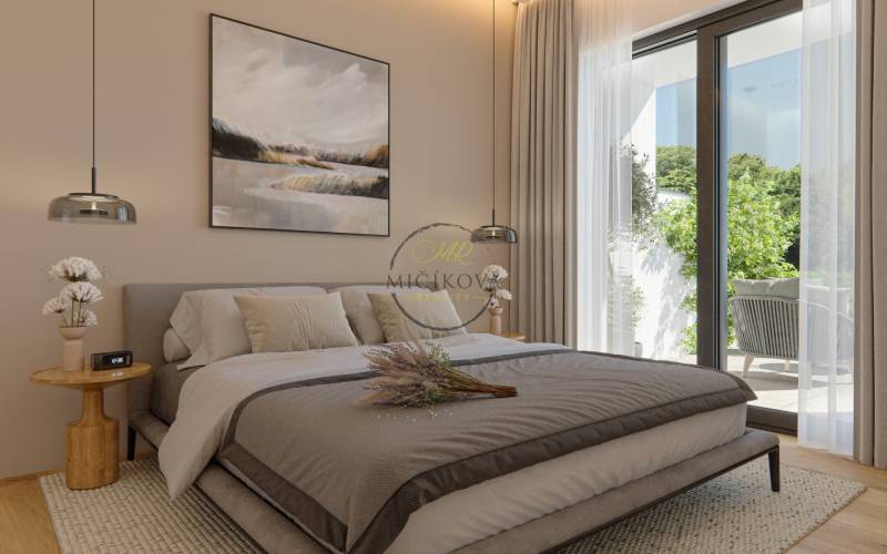 Bedroom in a family house with large windows, wooden decor flooring, and a painting on the wall.