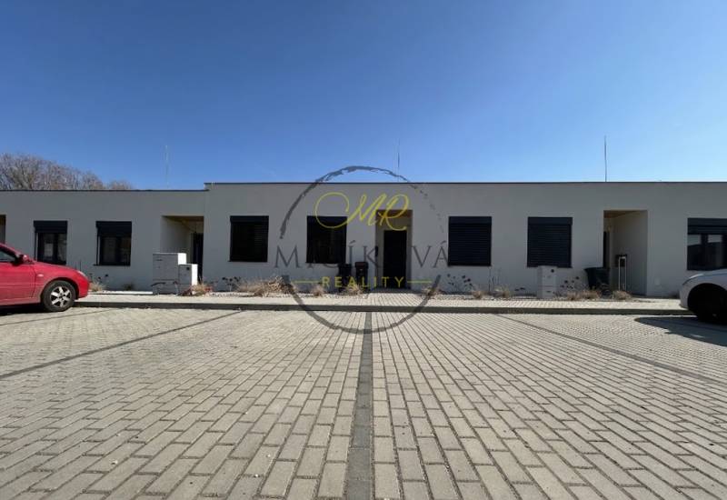 A family house in Klasov with a reinforced concrete area for parking.
