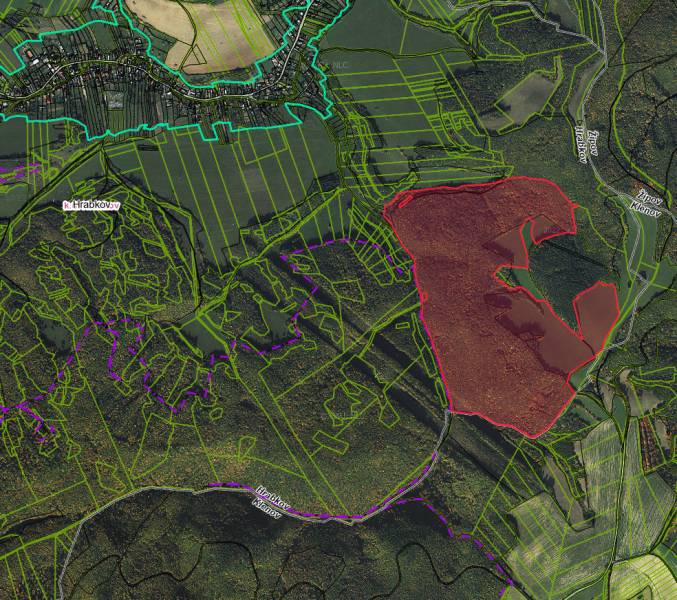 Aerial view of agricultural and forest lands around Hrabkov.