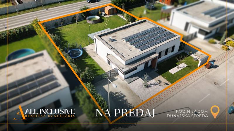 Family house for sale in Dunajská Streda with a lawn and solar panels.