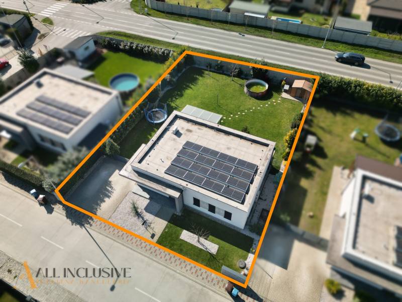 A family house in Dunajská Streda with a large plot, solar panels, and a swimming pool.