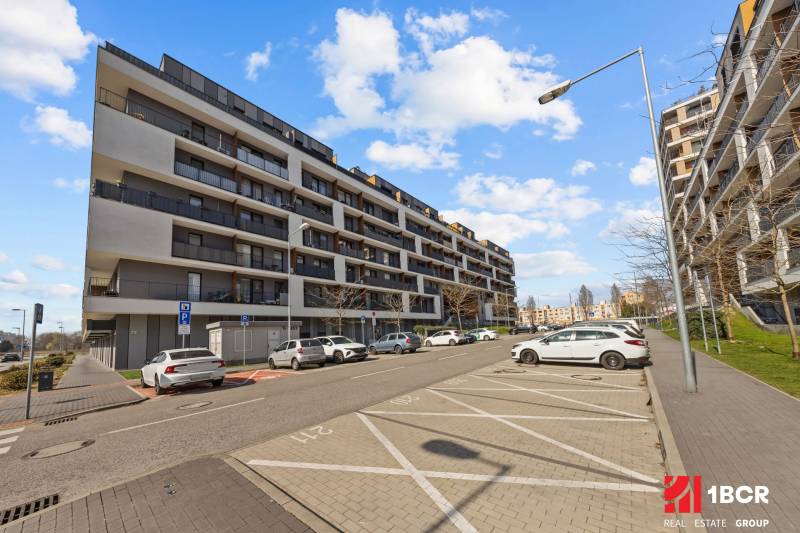 Residential building on Zuzany Chalupovej Street in Bratislava - Petržalka near the parking lot.