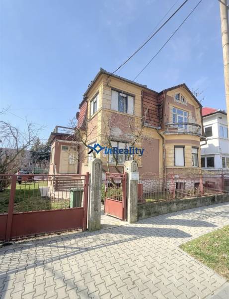 A family house on Gorkého Street in Rimavská Sobota with a front garden and an entrance gate.