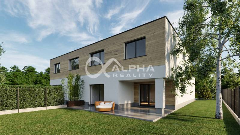 A family house in Harichovce with a terrace, lawn, and modern garden.