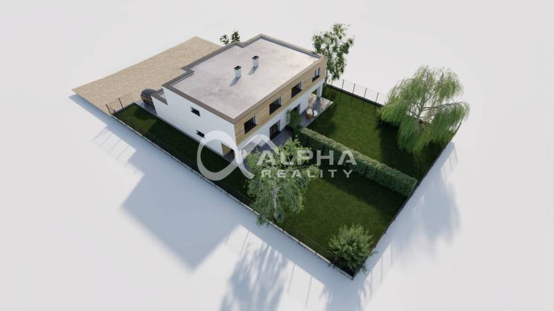 Aerial view of a family house with two chimneys and a garden in Harichovce.