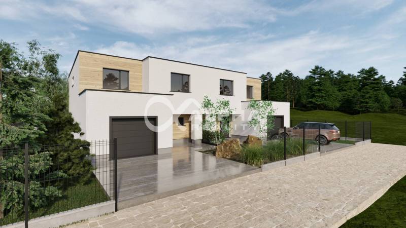A family house in Harichovce with a garage and green surroundings.