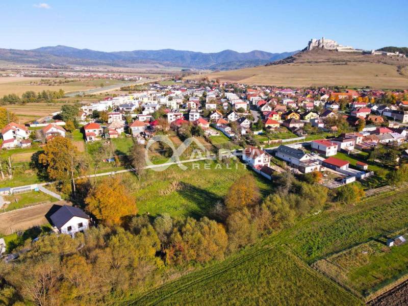 Aerial view of residential plots in Spišské Podhradie with a view of the castle.