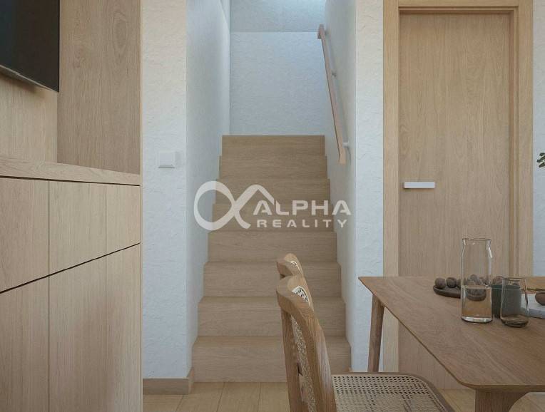 Interior with a staircase, wooden decor flooring, and wooden furniture. Real estate - housing.