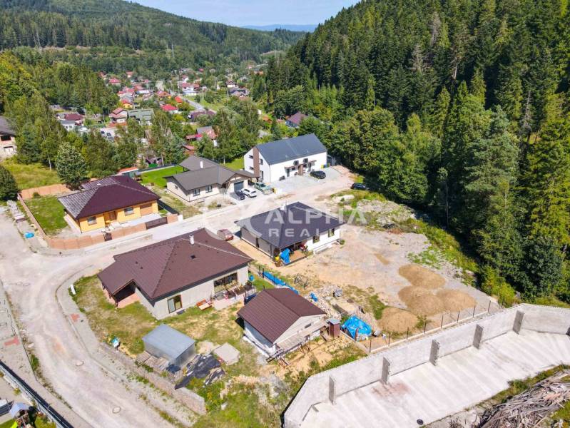 Aerial view of houses near the forest in the Spišská Nová Ves area.