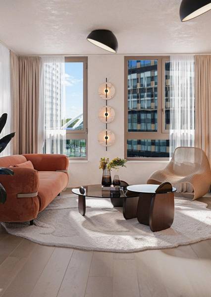 Living room in a three-room apartment with a sofa and a wooden decor floor.