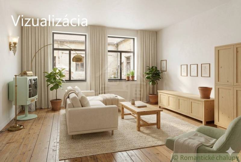 Living room in a family house with a wooden decor floor and green plants.