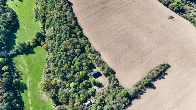 Agricultural and forest lands in Lackov show a contrast between the forest and cultivated land.