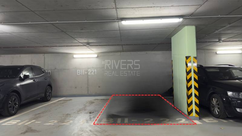 Parking space with vehicles and designation BII-221.