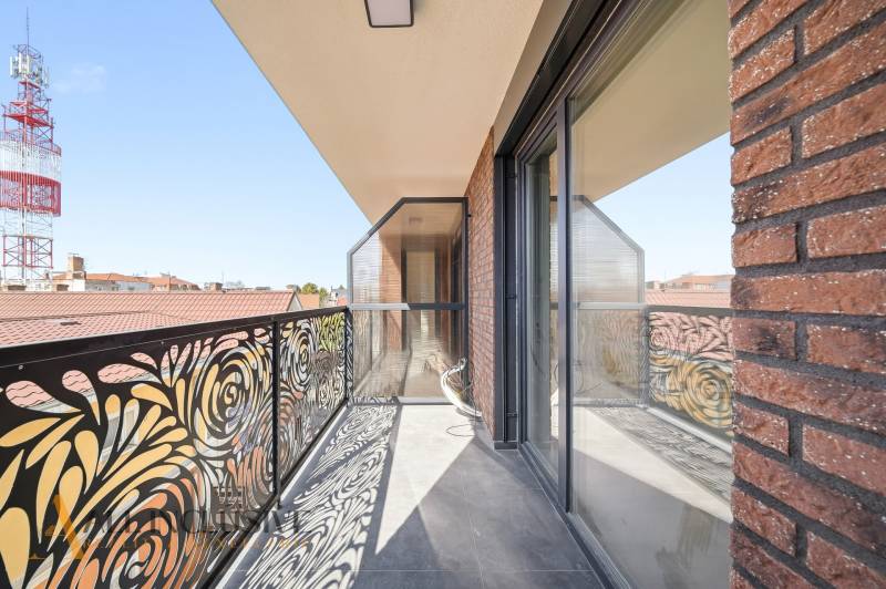 The balcony of a 2-room apartment on Bačákova Street in Dunajská Streda with decorative railing.