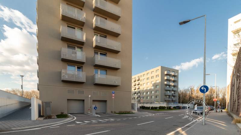Buildings in Bratislava - Trnávka on Ivanská cesta, with garages and parking.
