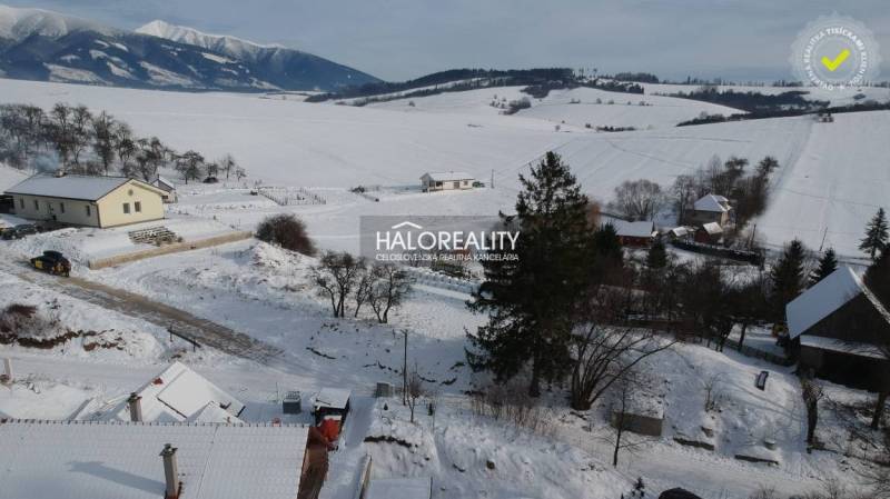 A snowy landscape of Liptovské Beharovce ideal for plots - living with a view of the mountains.