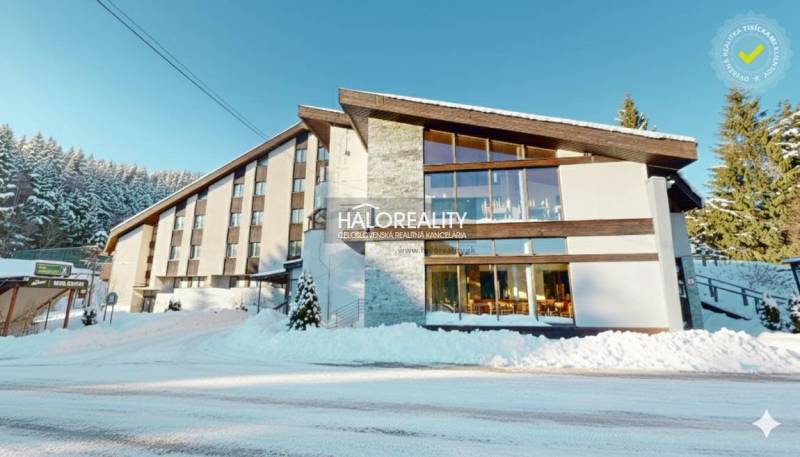 The image shows a hotel with a snowy landscape in Vyšná Boca, Hotels and guesthouses.