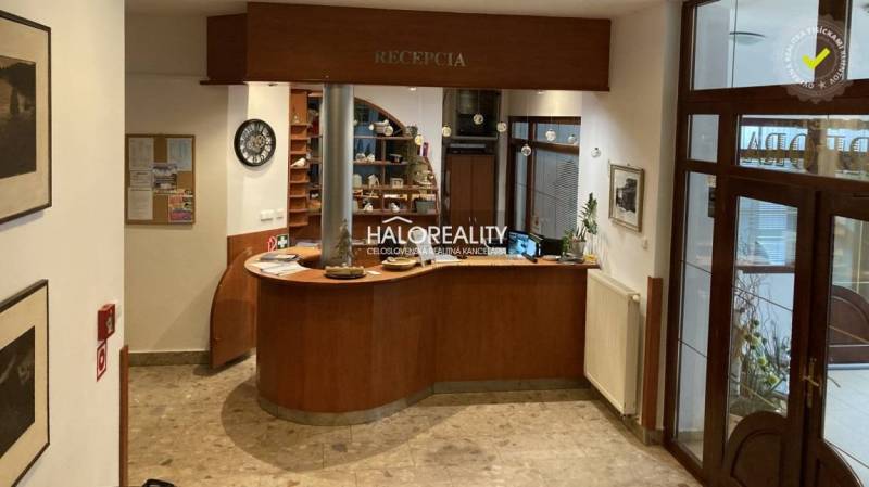 Reception with a wooden counter and decorations in hotels and guesthouses.