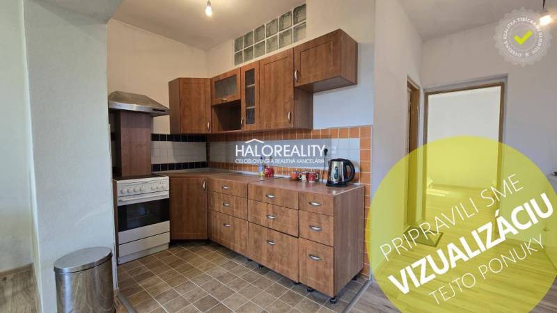 A kitchen in a family house with wooden decor cabinets and tiled flooring.