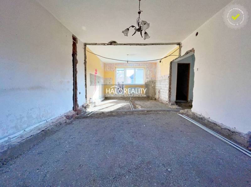 The interior of a family house with an unfinished room and preparation for renovation.