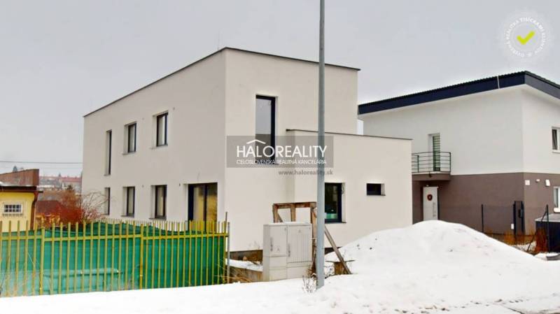 Snow cover at the offices in Poprad with regard to the architecture of the buildings.