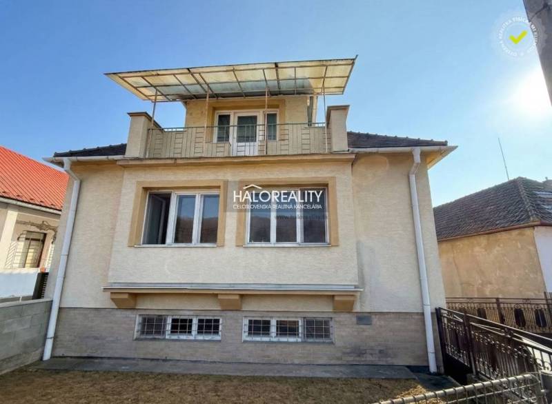 A family house in Dolné Vestenice with a terrace and a glass roof.