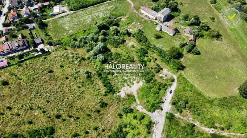 An aerial view of the land in Tornala surrounded by greenery and rural houses.