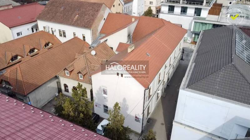 Commercial premises in Rimavská Sobota with red roofs from a bird's eye view.