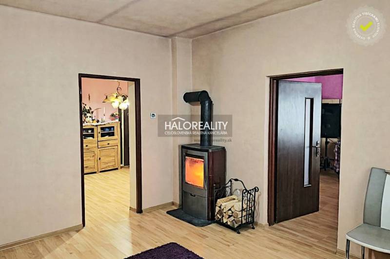 Fireplaces with wood-patterned floors in a family house.