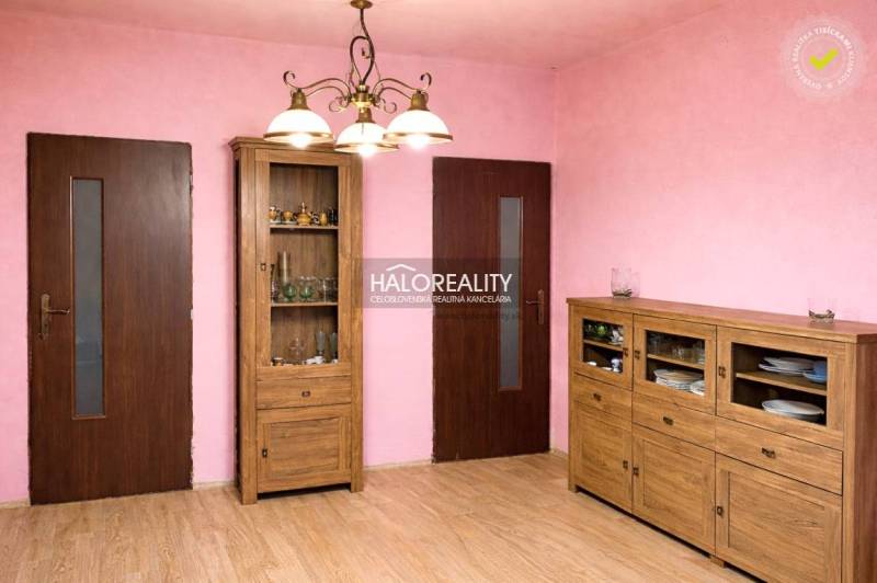 A room with wooden furniture and a floor with a wooden decor, Family house.