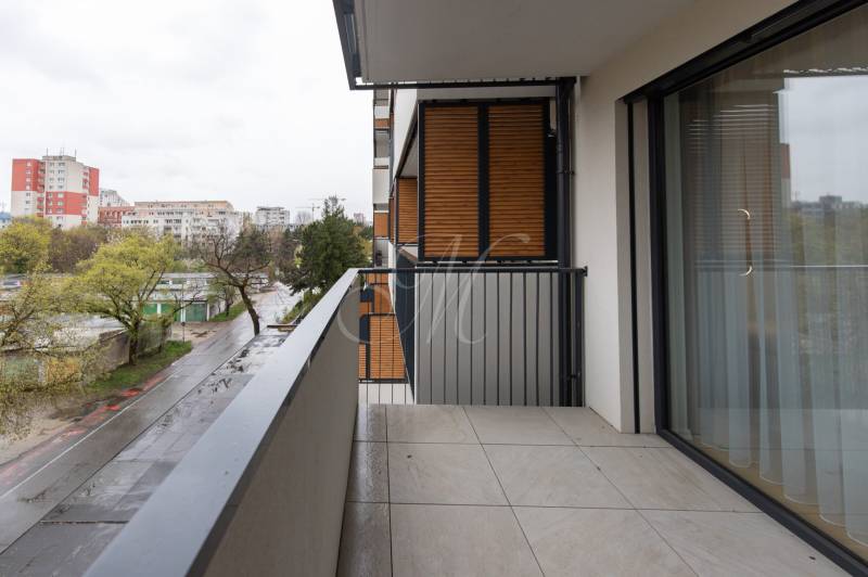 A balcony with tiles in a 2-room apartment, view of Trnavská cesta in Bratislava - Ružinov.