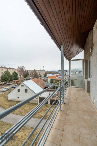 The balcony offers a view of the Poprad city district from a 4-room apartment.