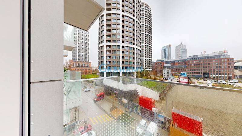 View from the balcony of modern buildings and the city in Bratislava on Bottova Street.