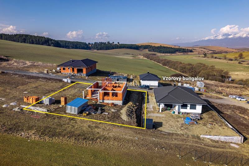 An unfinished family house in Tvarožná with a beautiful view of the surrounding countryside.