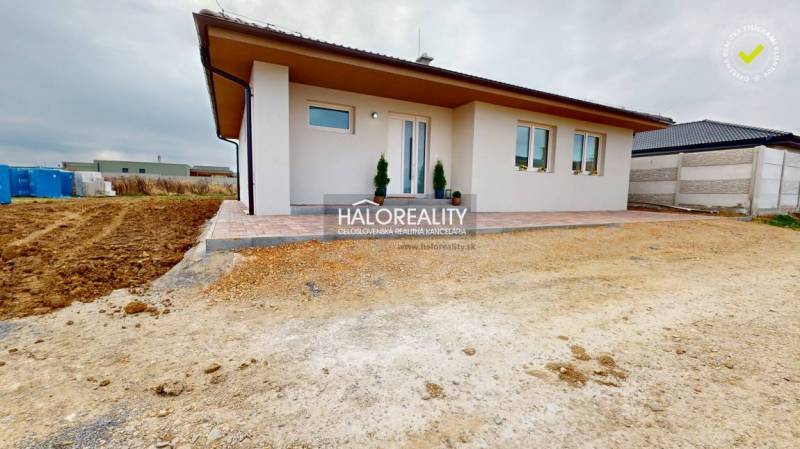 A family house in Rimavské Janovce with a terrace and an undeveloped plot.