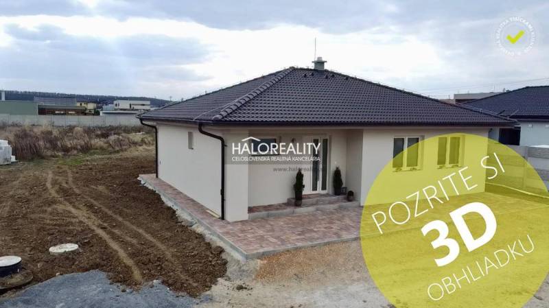 A family house in Rimavské Janovce with a nicely landscaped exterior and a terrace.