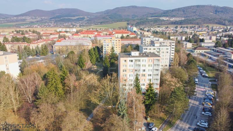 A view from above of the housing estate and surrounding nature on Trenčianska Street in Nová Dubnica.