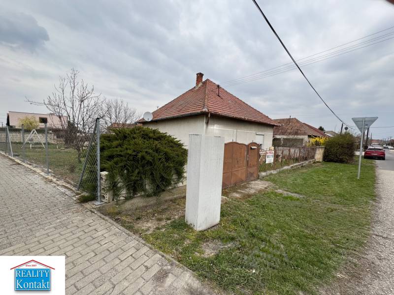 A family house on Bočná Street in Mojzesovo with a front garden and a wire gate.